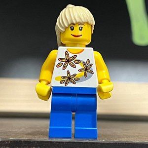LEGO City Female Minifigure with Yellow Flower Top
